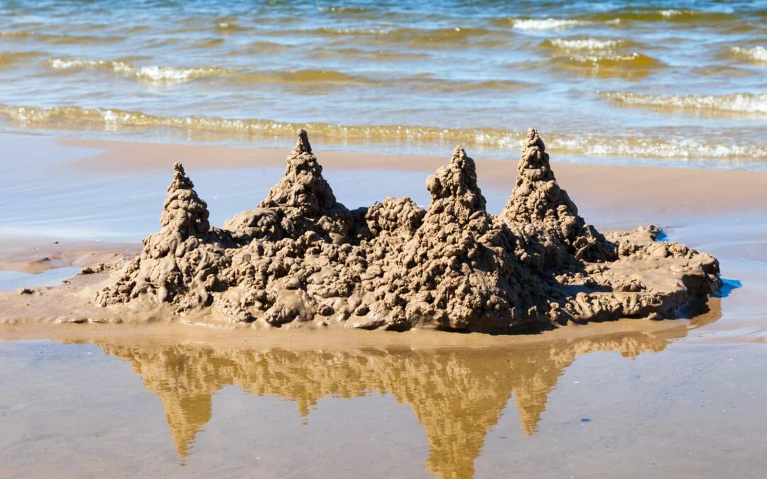 sand castle in waves